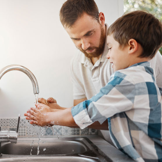 Father & son washing hands